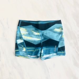 Blue Reebok running shorts
